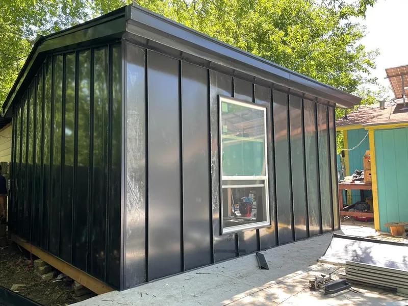 Black standing seam metal wall panels for Roof Inspection in Leisure City